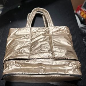 Calpak Luka Expandable Laptop Tote Gold quilted puffer bag